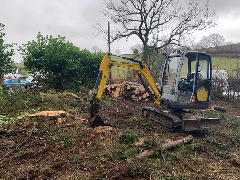 JH Landscaping & Groundworks Kendal and Lake District site clearance for commercial customer with digger